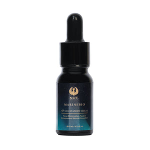 Black serum bottle with dropper labeled 'NUT MarineBio' on a white background